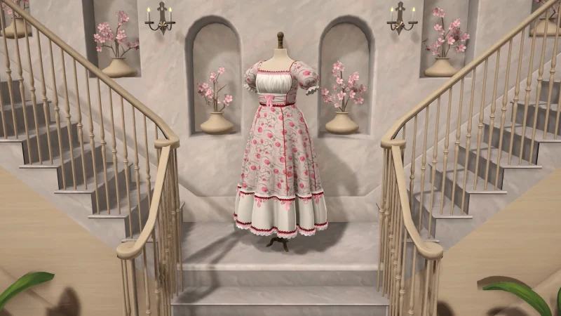 A completed cream dress with strawberry prints, pink bows and lace displayed on a mannequin